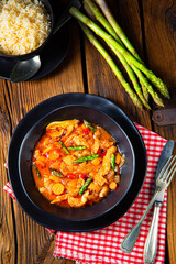 colorful turkey fricassee with asparagus and paprika