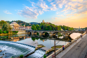 Turin, Italy. Panoramic view at sunset of the Po River, the Church of the Gran Madre, the Church of...