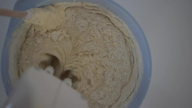 mixing the crepes pancake batter with the electric mixer