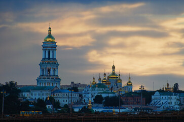 Scenic landscape view of ancient Kyiv Pechersk Lavra. Christian Orthodox monastery. UNESCO World Heritage Site. Stormy sky and gloomy clouds. Famous touristic place and travel destination in Kyiv