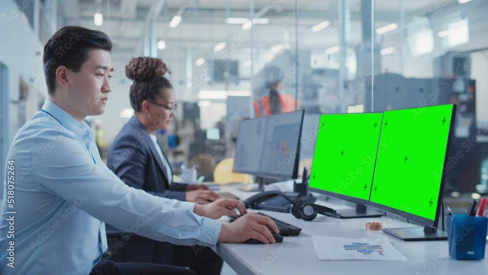 Aufkleber Factory Office Room: Industrial Engineers Developing Models of a Heavy Industry Machine Parts on a Computer 3D Software. Two Computer Monitor Displays are a Green Screen Mock Up Template.