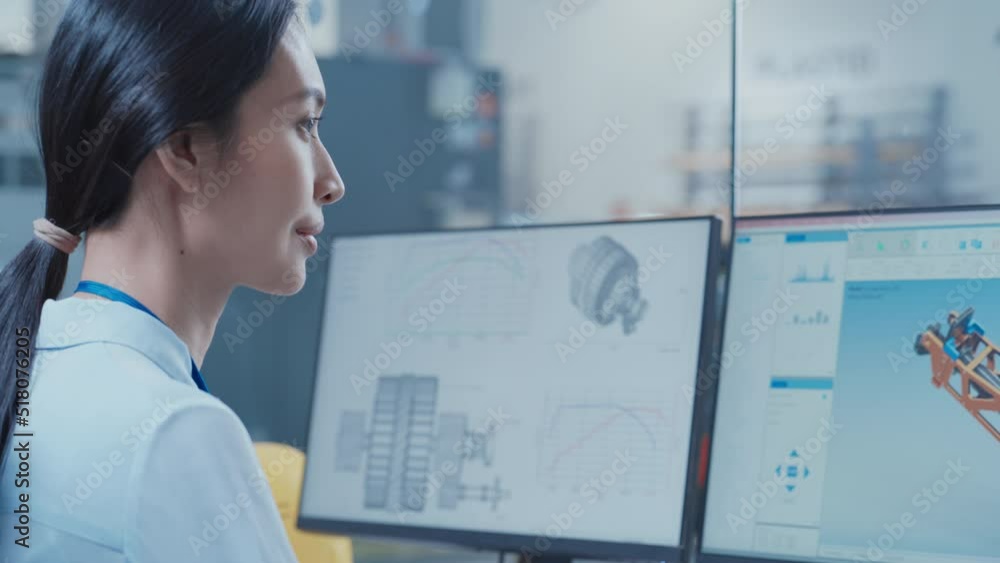 Aufkleber Portrait of an Asian Industrial Engineer Developing Models of a Heavy Industry Machine Parts on Computer CAD Software in a Factory. Modern Technological Research and Development Center.