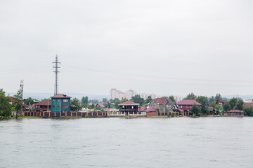 Flooded residential area. The water overflowed the banks of the river and went into the city.