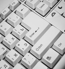 Black and white computer keyboard keys, selective focus, keyboard background