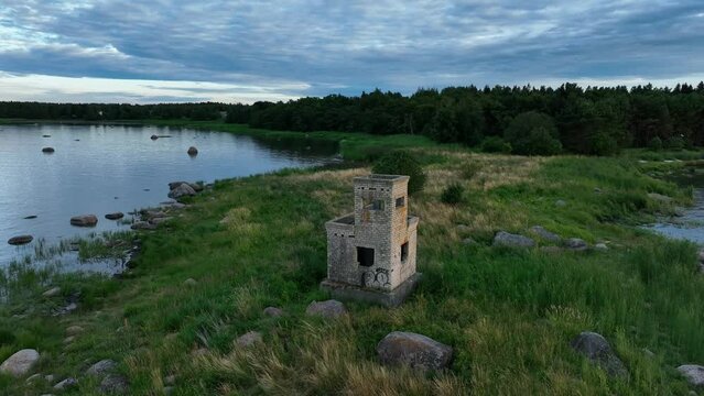 Drone footage of building that was a border guard post during the Soviet occupation in Estonia. It is now a reminder of that era. Leppneeme village, Estonia.