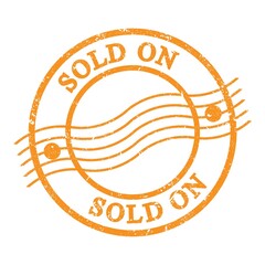 SOLD ON, text written on orange postal stamp.