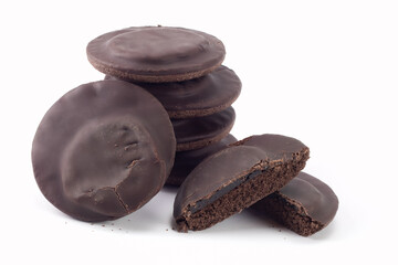 Chocolate cookies with jelly isolated on bright background. Close up view.