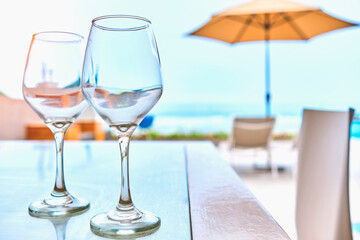 Luxury terrace balcony for relaxed vacation at wine glasses, selective focus. Travel luxury concept