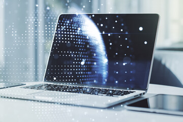 Multi exposure of abstract creative digital world map on modern laptop background, tourism and traveling concept