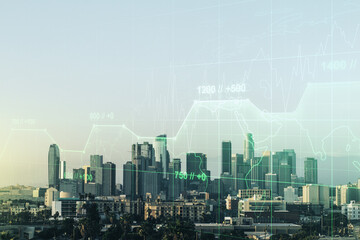 Fototapeta na wymiar Double exposure of abstract virtual statistics data hologram on Los Angeles city skyscrapers background, statistics and analytics concept