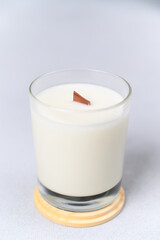 Soy Candles in Transparent Glass jar with Wooden lid. Place for Label. Concept of Soy Candles.