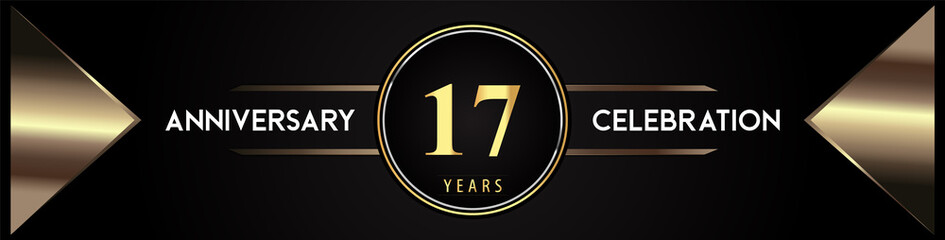 17 years anniversary celebration logo with gold number and metal triangle shapes on black background. Premium design for weddings, greetings card, happy birthday, poster, banner.