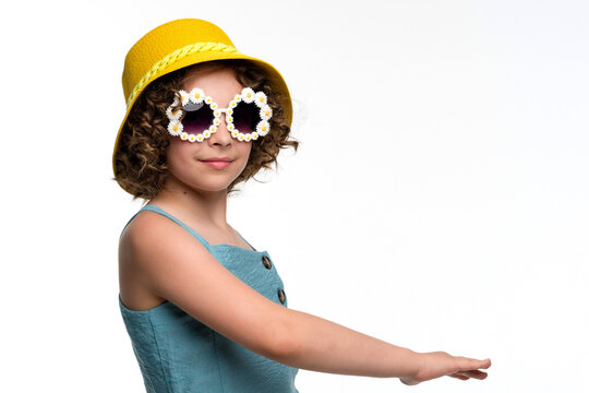 Girl in panama hat and sunglasses