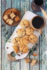 Homemade chocolate chip cookies from stale bread and cup of coffee