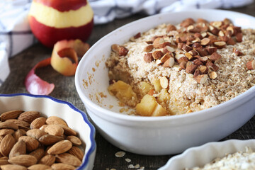 Fresh apple crumble from oatmeal, almondes dressing