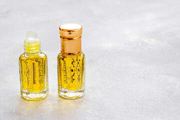 Perfume essential oil in glass bottles. Traditional Arabian incense
