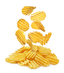 Ridged crispy potato chips falling into heap on white background
