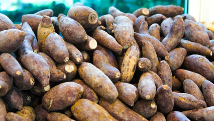 Fototapeta na wymiar Sweet potatoes at vegetable shop