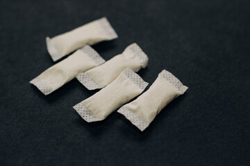 Nicotine snus spiders, tobacco pads, quit smoking concept.