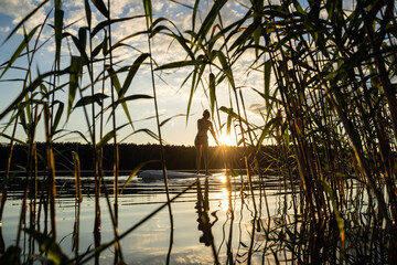 Woman paddling a SUP on the lake