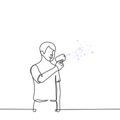 man blowing bubbles from bubble generator - one line drawing vector. concept adult having fun with a soap gun