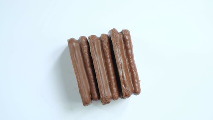 Chocolate biscuits coated with chocolate cream