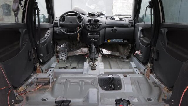 Disassembled Interior Of The Car Without A Seat And Mats, Repair The Car.