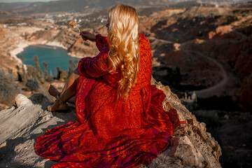 Plus size woman with beautiful blond hair , wearing red boho style clothes enjoy the time in nature...