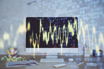 Forex graph hologram on table with computer background. Double exposure. Concept of financial markets.