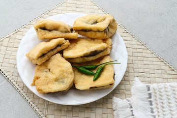 Tahu Petis is a typical Semarang snack, javanese traditional snack. Fried Tofu eaten with petis or processed food made from black shrimp paste smeared or inserted in the middle of tofu.
