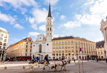 Foto op Plexiglas Horse carriages on St. Michael square (Michaelerplatz), Vienna, Austria © Mistervlad