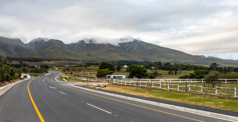 Road and idyllic landscapes of the garden route that runs along the fynbos peninsula that runs along the entire South African coast from Port Elizabeth to Cape Town and ideal for vacations and tourism