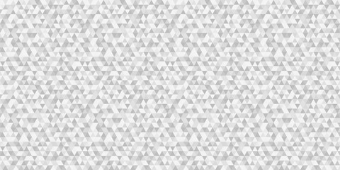 Seamless triangle pattern. Multicolored background. Mosaic geometric wallpaper of the surface. Image for flyers, banners and textiles. Wrapping paper. Black and white illustration