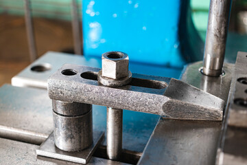 Automation hydraulic press stamping machine production line. industrial metalworking machines. Close-up of a hydraulic press in an industrial workshop at a factory.
