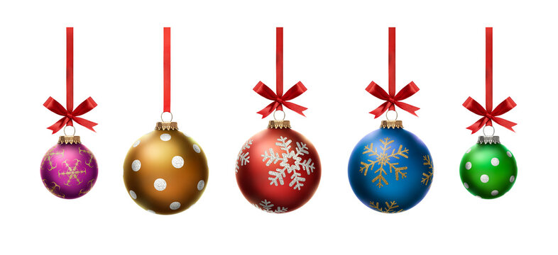 Blue, green, gold, pink and red Christmas bauble tree decorations isolated against a white background.