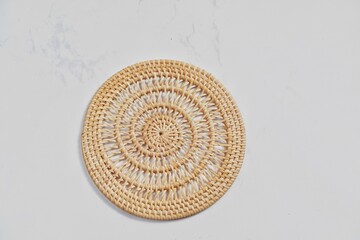 Handmade round woven placemat.isolated on a white background.