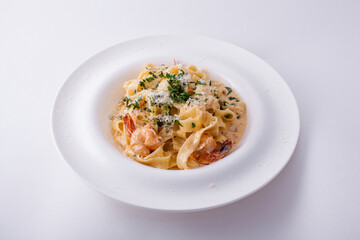 Spaghetti with squid, shrimps, cheese