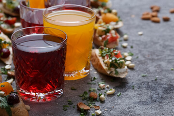 Summer drinks and toasts with fruits on a gray table. Healthy food, dietary snack, vegetarian snacks.