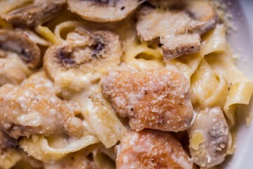 Pasta with meat, champignon, cheese