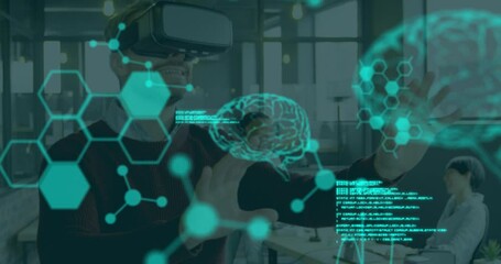 Animation of scientific data over caucasian man wearing vr headset in office - Powered by Adobe