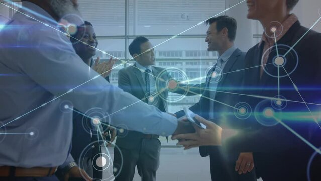 Animation of globe and connections over diverse business people shaking hands