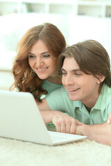 Young couple reading book