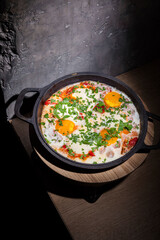 Omelet with parsley, pepper and ketchup