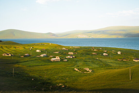 Abandoned Vladimirovka village by Paravani lake in summer