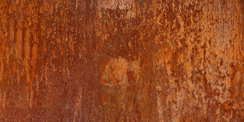 Panoramic rusty and oxidized metal sheet, old copper texture background
