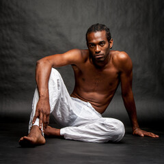 Capoeira artist. A relaxed and confident pose from a capoeira martial arts character. From a series...