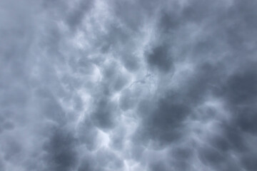 Background of mammatus clouds in gray color