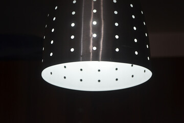 A modern ceiling lamp, with a unique design