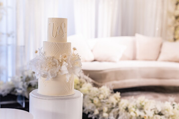 Fototapeta na wymiar Beautiful wedding cake decorated with white flowers
