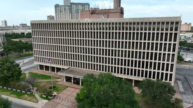 Aerial of USA Federal Building. American flag at government offices. FBI, CIA, Homeland Security, Social Security Administration, IRS building.